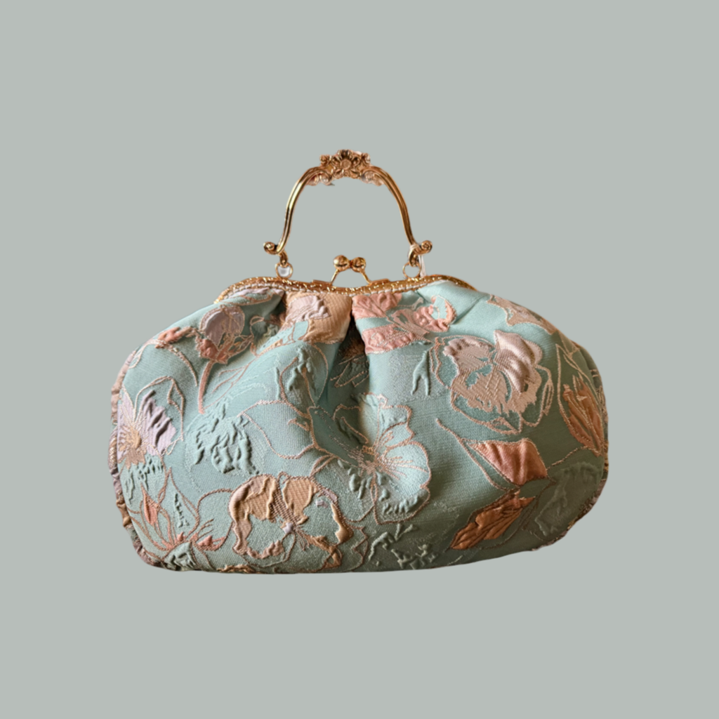 Clutch pasticcino matelassé verde acqua con chiusura gioiello 4